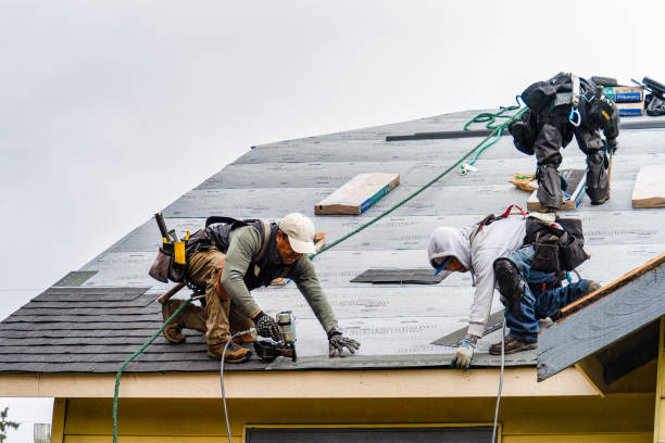 Professional Gutter Installation technician working in Yoder, WY